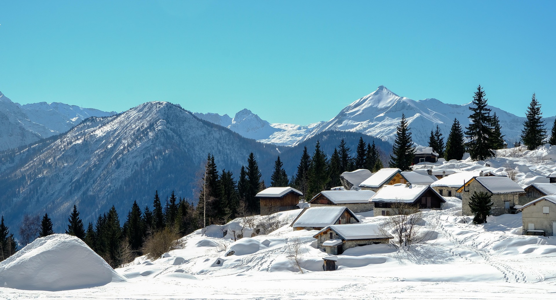 Chalets on sunny mountain